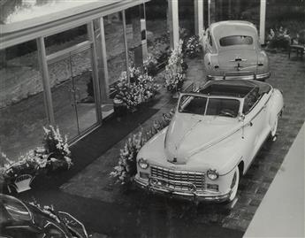 (CARS--DODGE) Album with 32 photographs entitled Conway-Jalovec Inc., documenting a Dodge dealership in Cleveland, Ohio.